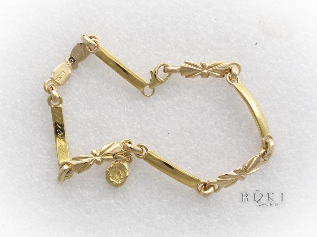 armband-i-18k-guld-gjort-av-gamla-släta-ringar