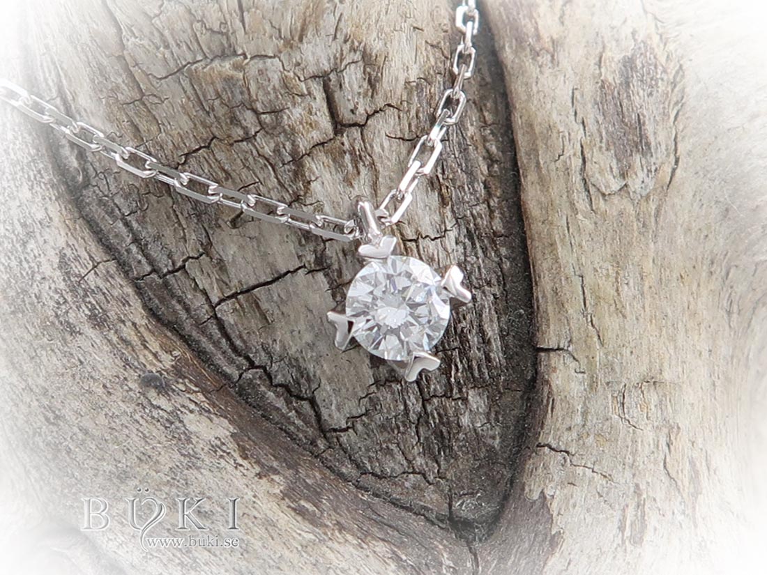 diamant hänge i 18k vitguld med 4 hjärtan